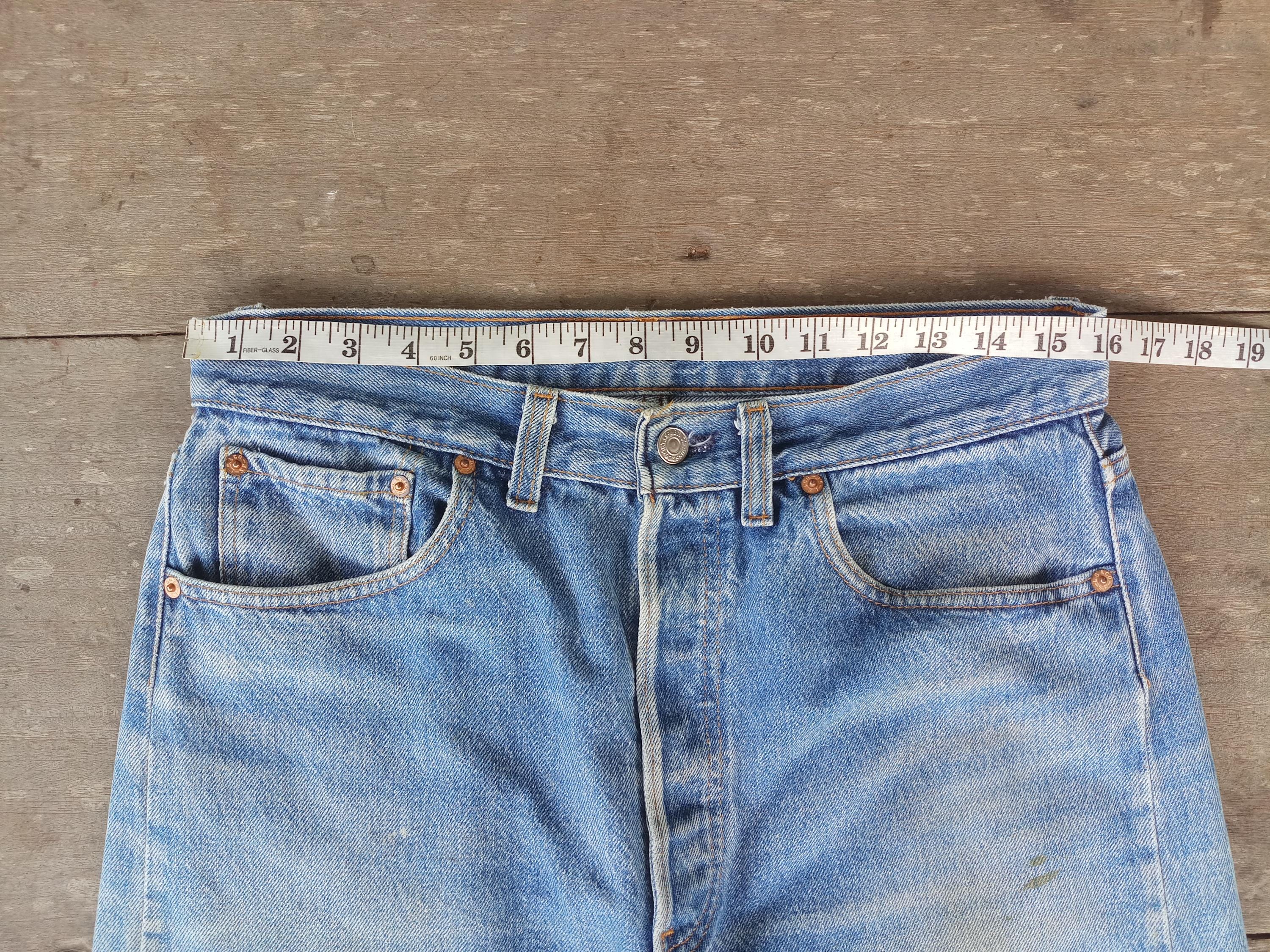 Vintage 80s Levi's 501 Jeans: Ripped Denim, Made in USA (W32 L32.5