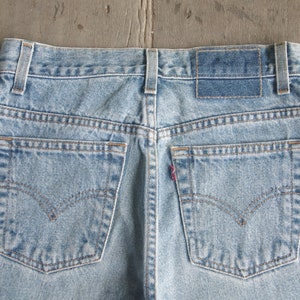 Faded jeans,vintage levis 550 size 7 JR W26 W27 L31.5 ,levis for women ,cool,levis Denim, retro,hipster image 7