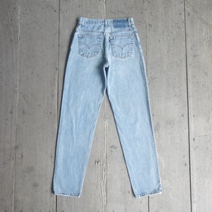 Faded jeans,vintage levis 550 size 7 JR W26 W27 L31.5 ,levis for women ,cool,levis Denim, retro,hipster image 1