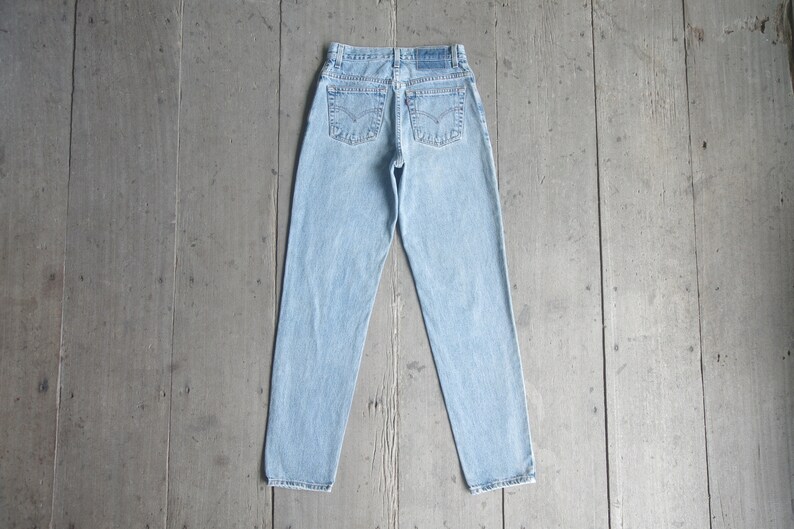 Faded jeans,vintage levis 550 size 7 JR W26 W27 L31.5 ,levis for women ,cool,levis Denim, retro,hipster image 1