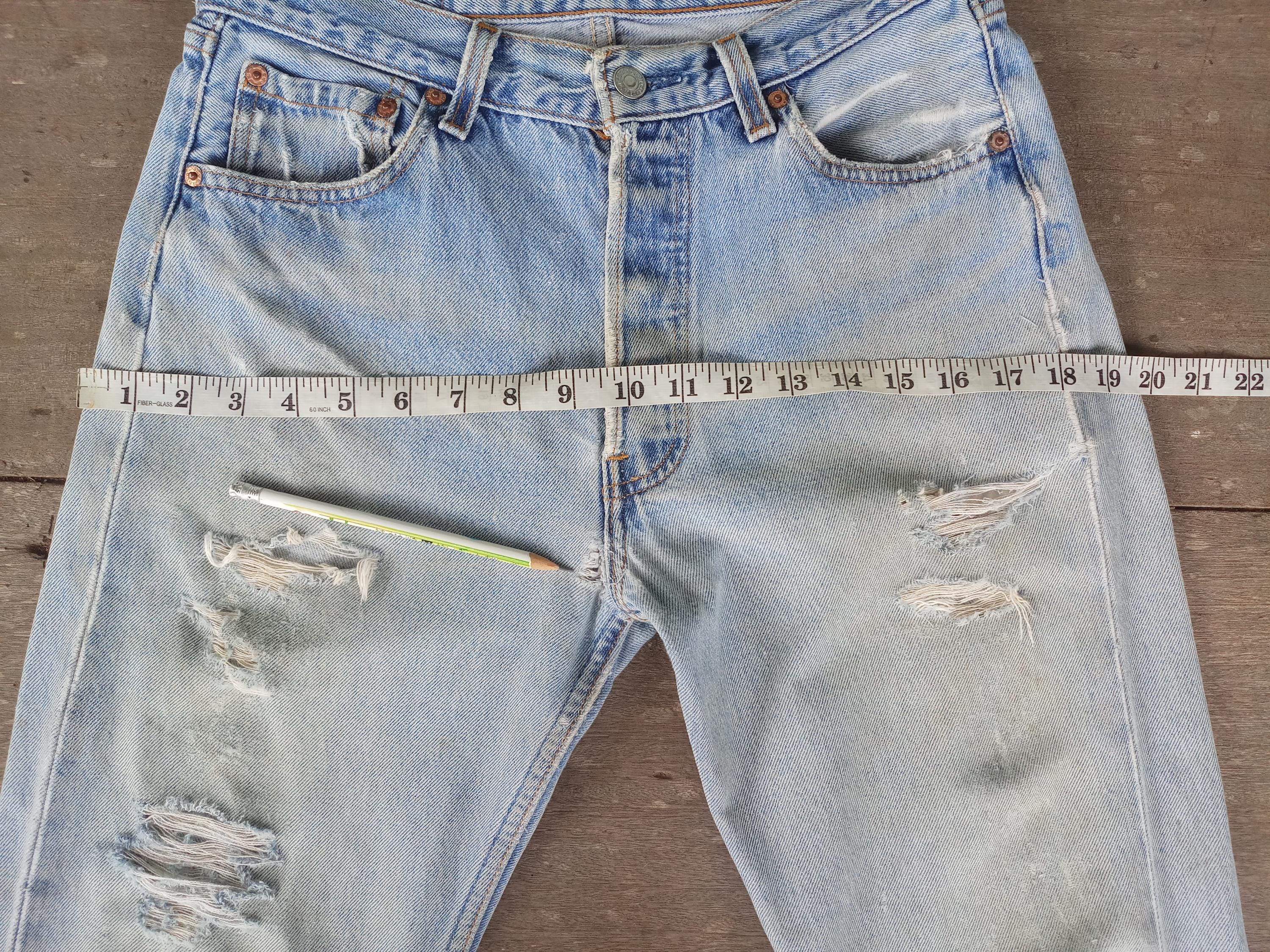 Distressed Vintage Levi's 501xx Jeans: Ripped Retro Denim, Made in