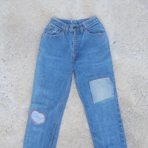 Vintage 80-tals Levis 505-jeans: Högmidjade patchwork-denim (W25)