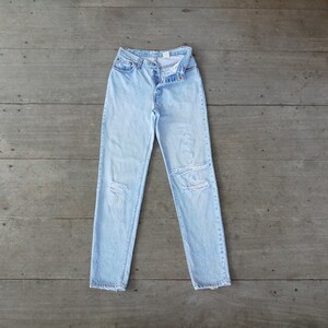 Ripped jeans,Vintage levis 501  W26 L31, levis for women ,levis light wash ,retro,cool ,hipster,levis made in usa.