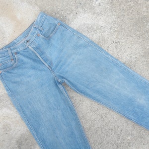 Beautiful,Faded jeans,vintage  levis 701  student W28 L30.5,levis for women ,levis Denim,cool ,retro,hipster,levis made in usa.