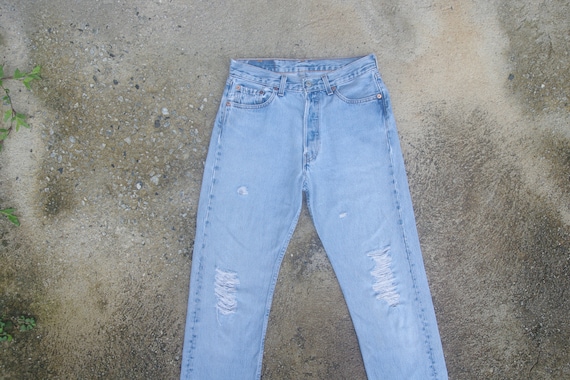 Faded jeans, vintage levis 501 blue jeans W28 L32,