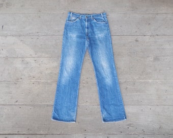 Perfect ,Vintage 80s levis 20517 -0217 Orange tab  W36 L35.5,levis boot cut ,cool , hipster, retro ,levis made in USA.