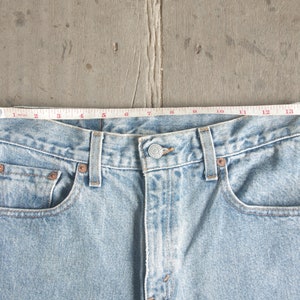 Faded jeans,vintage levis 550 size 7 JR W26 W27 L31.5 ,levis for women ,cool,levis Denim, retro,hipster image 3