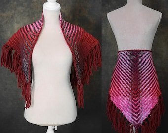 Handwoven triangle shawl made from yarn scraps.