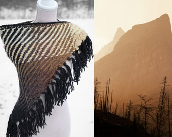 Handwoven triangle shawl made from yarn scraps.