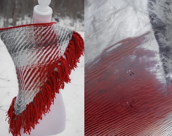 Handwoven triangle shawl made from yarn scraps.