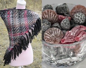 Handwoven triangle shawl made from yarn scraps.