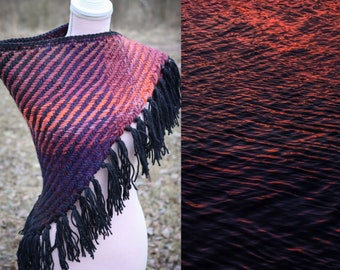 Handwoven triangle shawl made from yarn scraps.