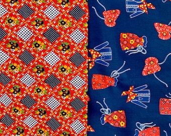 May include: Red and white checkered fabric with a floral pattern, sewn together with a blue fabric with a white pattern of stylized figures wearing dresses and jackets.