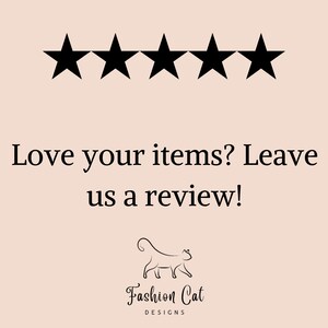 May include: Five black stars with a white background. The text "Love your items? Leave us a review!" is below the stars. The text "Fashion Cat Designs" is below the text.