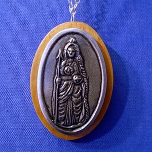 Handmade Wooden Oval  Pendant with A Pewter *Bridgid. Comes on an 18&quot; Chain.