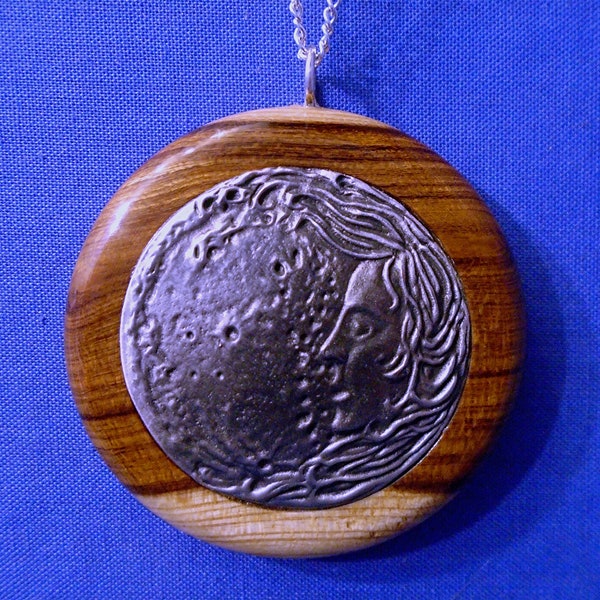 Handmade Wood & Pewter Pendant  *Luna Moon Goddess*  comes on an 18" Chain.  Makes a lovely Gift as it comes in a presentation box.