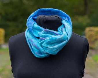 Nuno felted loop scarf, with silk and merino wool, different shades of blue with silk accents of violet, infinity scarf.