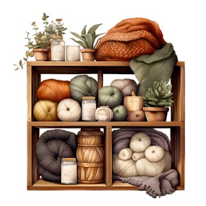 May include: A wooden shelf unit with three shelves, filled with various items, including yarn balls, knitted blankets, candles, and plants. The shelf is painted a light brown color and has a rustic look.