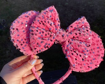 Orejas de lentejuelas de terciopelo rosa intenso