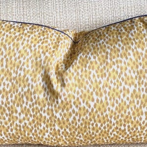 P Kaufmann Arnaud in Lemon is a Lumbar Pillow with  a small scale animal printed fabric