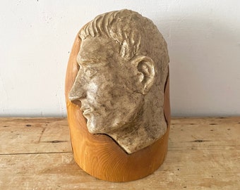 Unique vintage pottery face head sculpture  on wood statue