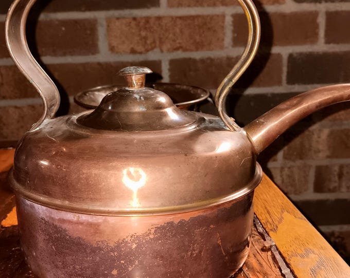Vintage copper teapot with unusual ribbed handle