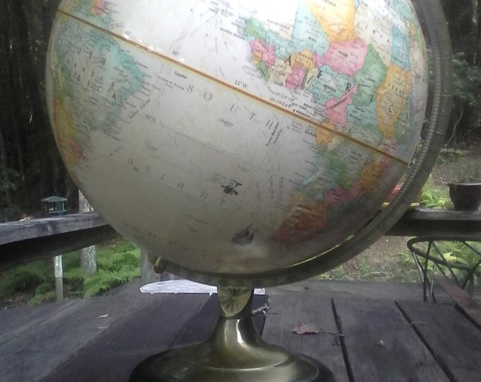 Globemaster Replogle Globe 12-inch raised relief globe, 3-D topography, nicely aged metal brace and base, slight wear on bottom