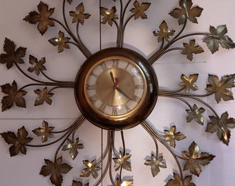 Mid-century Starburst Maple Leaf Clock United Clock Co. 24 inches working plug-in wall clock