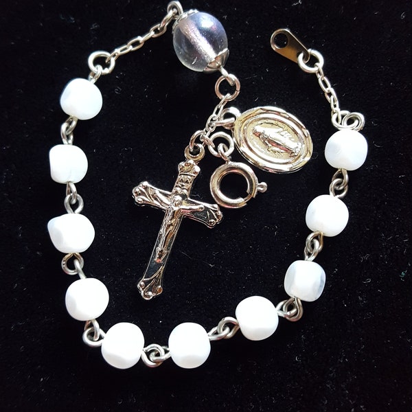 Handcrafted 7-inch rosary bracelet with milky white dimple Ave beads.