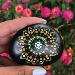 Hand painted dot art on rock/mandala art/painted rock art