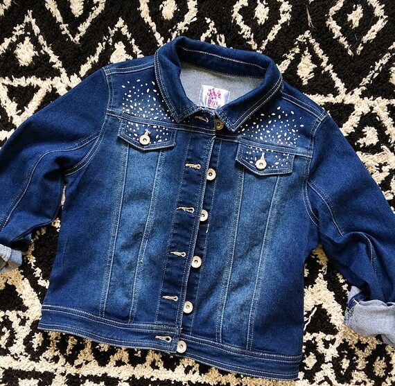 jean jacket with mama on back