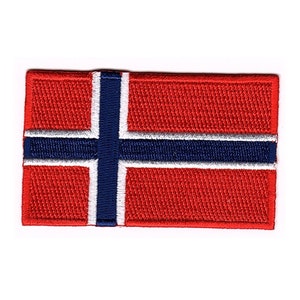 May include: An embroidered patch featuring the flag of Norway, with red, white and blue colours.