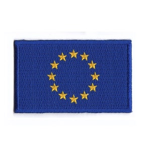 May include: A blue embroidered patch with a circle of 12 yellow stars.