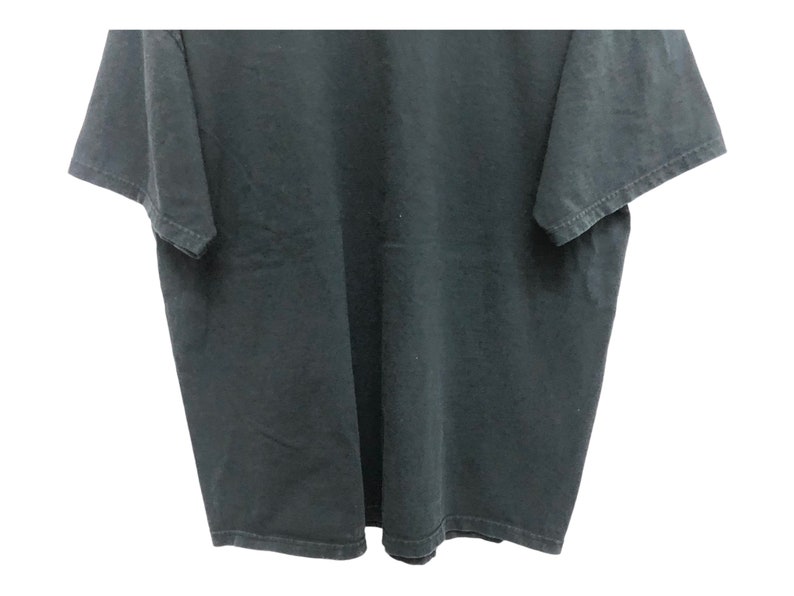 May include: A black t-shirt with short sleeves.