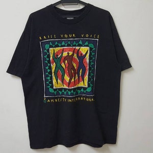 Vintage 90s AMNESTY INTERNATIONAL raise your voice ortega artwork single stitch made in usa t shirt vintage art tee
