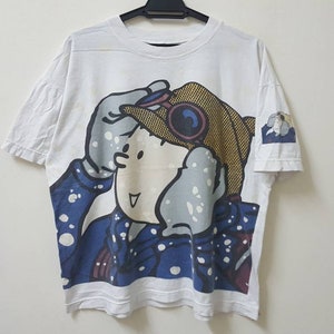 Vintage 90s the adventures of TINTIN cartoon comic character big front graphical rare design boxy tee dope
