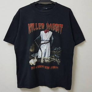 May include: Black t-shirt with a graphic featuring a headless knight holding a sword, a white rabbit, and the text "KILLER RABBIT" and "RUN AWAY! RUN AWAY!".