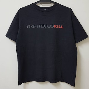 May include: Black t-shirt with the text "RIGHTEOUSKILL" in white and red lettering.