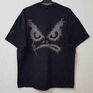 Vintage 90s 1994 BAD BOY skateboard surf big logo t shirt design by LOUIE rare design t shirt