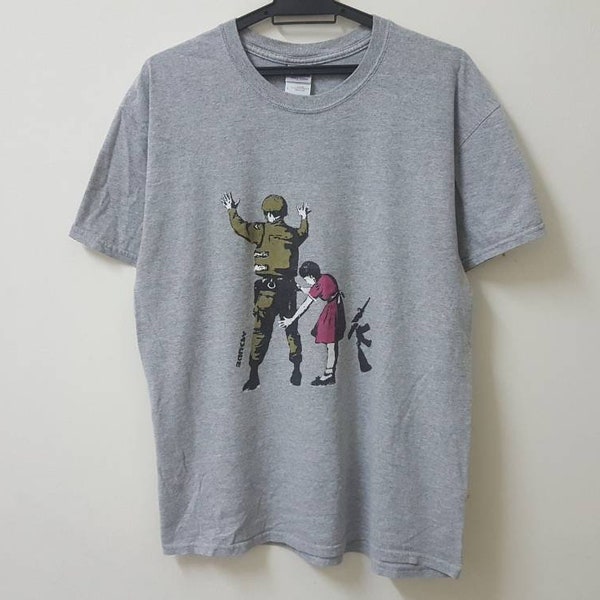 Vintage 00s BANKSY girl frisking soldier street art hype dope swag style t shirt