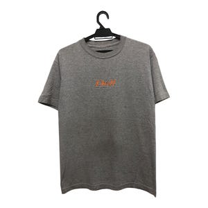 Camiseta vintage de los años 90 con estampado desgastado de la marca estadounidense DRILL, estilo skate, surf, streetwear, logotipo en el centro de la espalda.