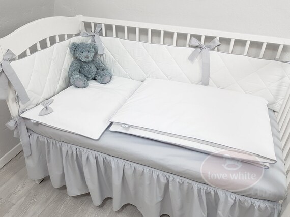 light grey cot bed