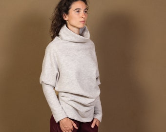 BATIFUL - elegant bat sweater with a high collar made of 100% eco-certified. Merino wool in size M, color light sand, cozy, fine, light