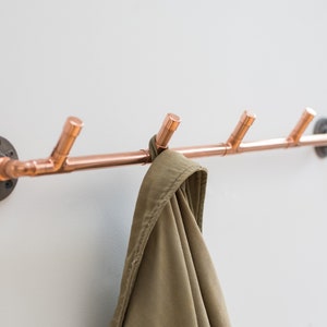 Coat hooks handcrafted from copper pipe – Industrial pipe decor