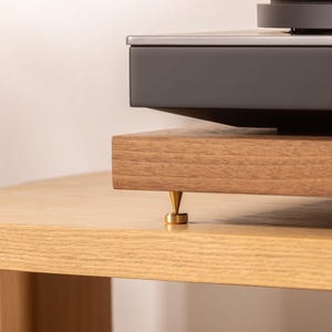 Solid walnut noise isolation platform with brass or chrome spike feet. This is for your turntable or amplifier to reduce vibration and enhance audio quality.
