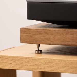 Solid walnut noise isolation platform with brass or chrome spike feet. This is for your turntable or amplifier to reduce vibration and enhance audio quality.