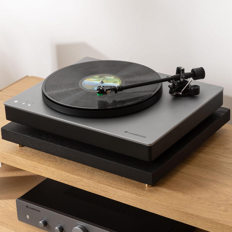 Black stained ash noise isolation platform with brass or chrome spike feet. This is for your turntable or amplifier to reduce vibration and enhance audio quality.