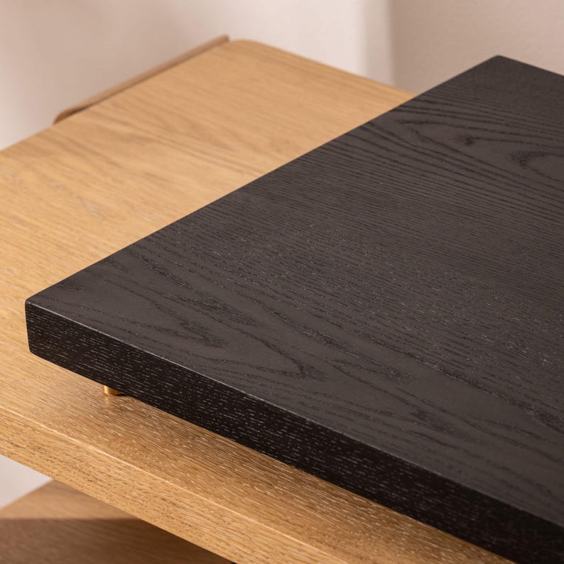 Black stained ash noise isolation platform with brass or chrome spike feet. This is for your turntable or amplifier to reduce vibration and enhance audio quality.