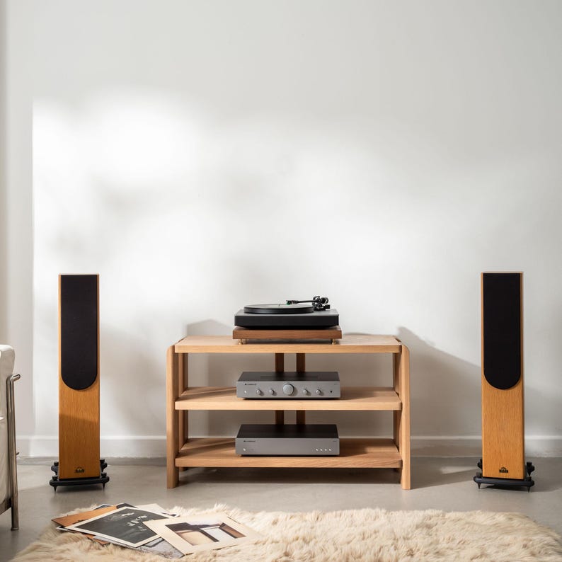 Solid walnut noise isolation platform with brass or chrome spike feet. This is for your turntable or amplifier to reduce vibration and enhance audio quality.