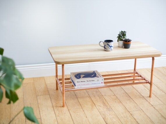 Side table with online basket underneath